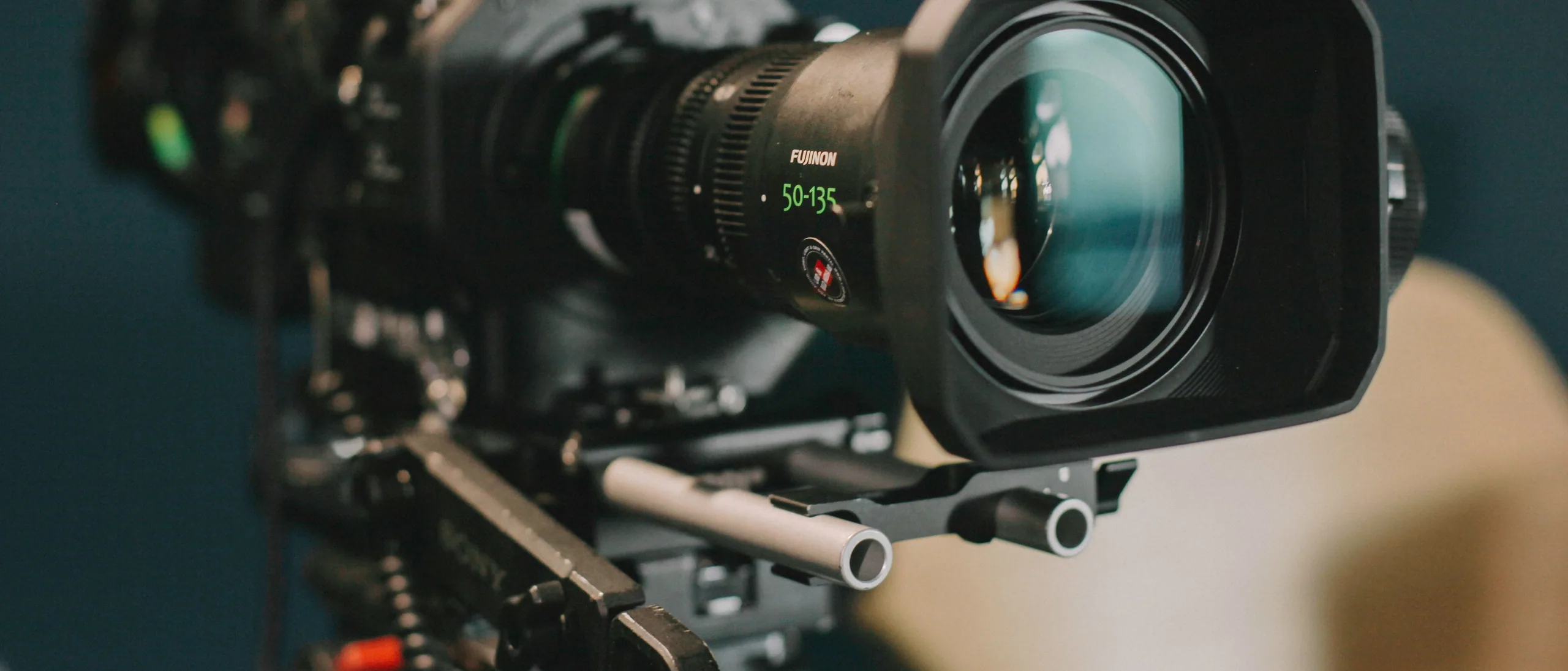 Sony cinema broadcast camera with Fujinon zoom lens framed for a multi-camera capture.